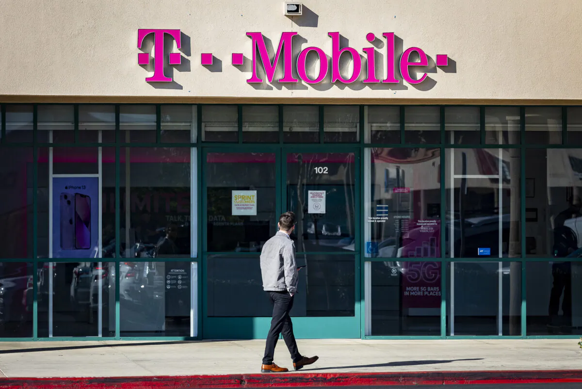 A T-Mobile store that was victim to a smash and grab robbery sits open for business in Fountain Valley, Calif., on Jan. 27, 2022. (John Fredricks/The Epoch Times)
