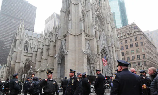 Thousands Attend Funeral for First of Two Slain NYPD Officers
