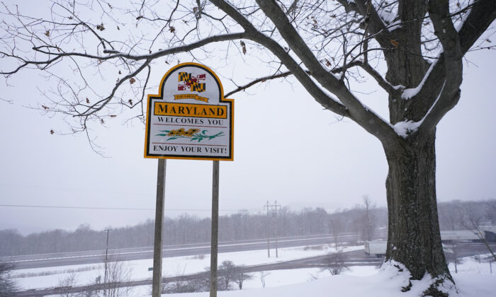Snow covers the Youghiogheny Overlook Welcome Center along Interstate-68 near Maryland’s west border with West Virginia, in Friendsville, Md., on Jan. 28, 2022. (Julio Cortez/AP Photo)
