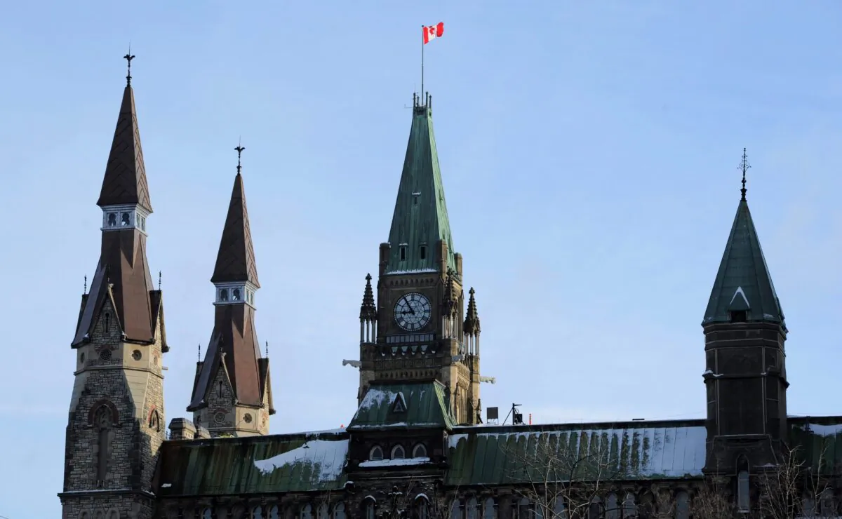 The Peace Tower rises above the West Block on Parliament Hill in Ottawa, in a file photo. (Sean Kilpatrick/The Canadian Press)