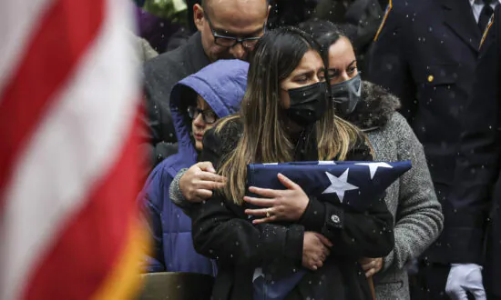 Killed Officer’s Widow Lashes out at Manhattan DA