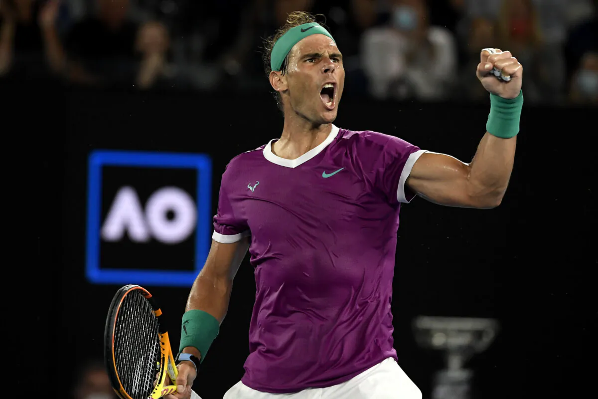 Rafael Nadal of Spain reacts after winning a point against Daniil Medvedev of Russia in the men’s singles final at the Australian Open tennis championships in Melbourne, Australia, on Jan. 30, 2022. (Andy Brownbill/AP Photo)