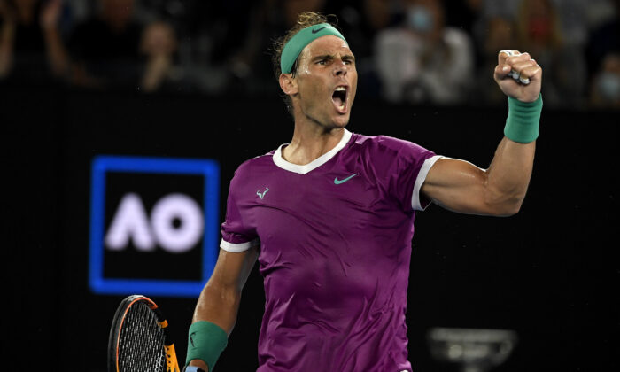Rafael Nadal of Spain reacts after winning a point against Daniil Medvedev of Russia in the men’s singles final at the Australian Open tennis championships in Melbourne, Australia, on Jan. 30, 2022. (Andy Brownbill/AP Photo)