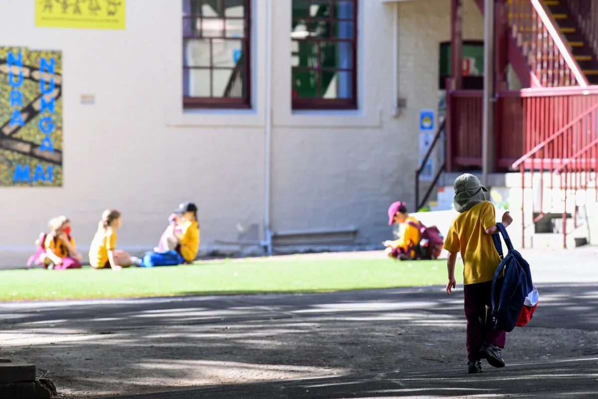 School students return back to school after COVID-19 restrictions were lifted at Glebe Public School in Sydney, Australia, Oct. 18, 2021. (AAP Image/Bianca De Marchi) 