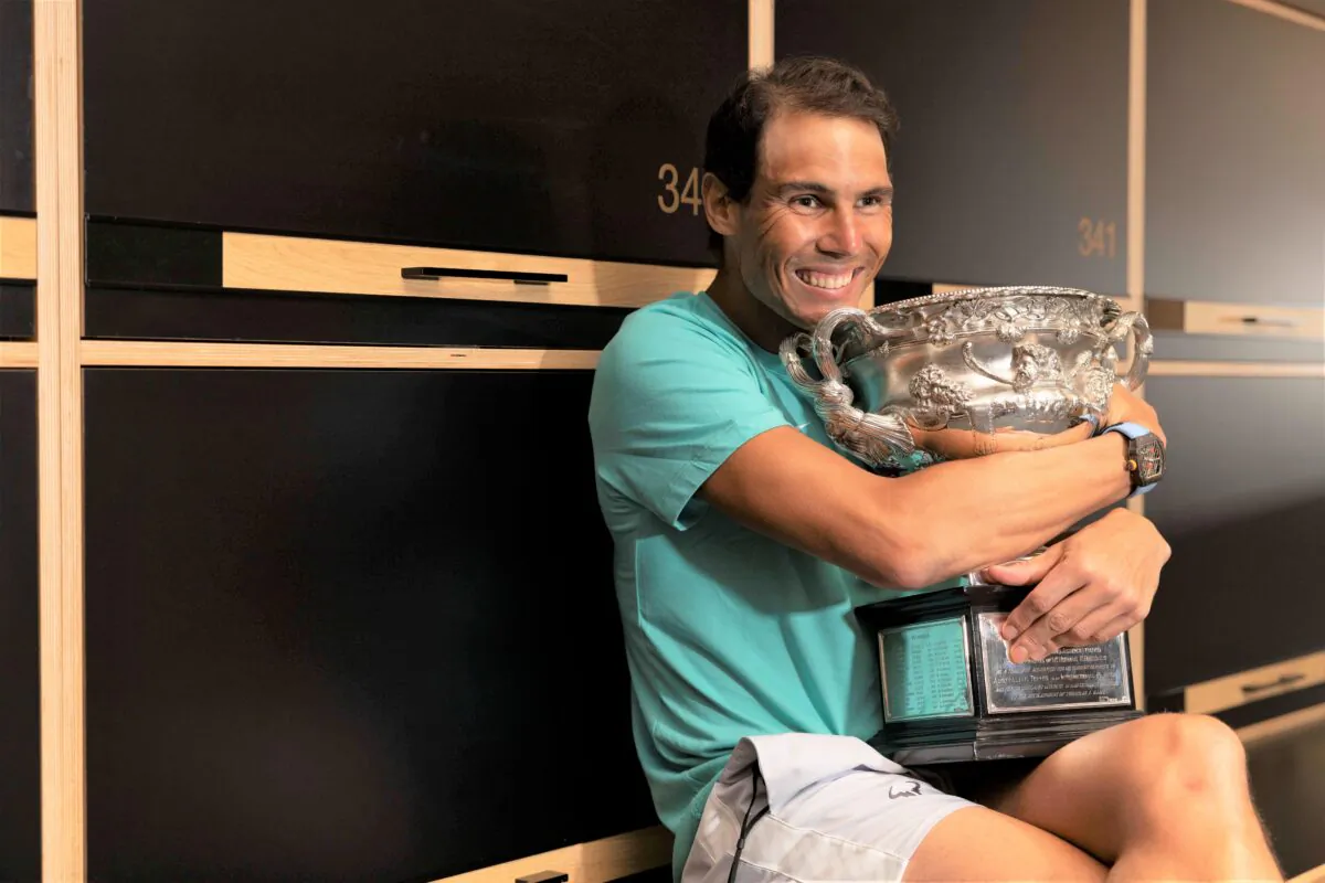 Rafael Nadal posing with the Australian Open men’s singles final trophy in the locker room at Melbourne Park in Melbourne, Australia, on Jan. 31, 2022. (AAP Image/Supplied by Fiona Hamilton, Tennis Australia)