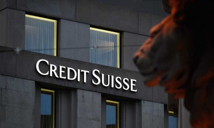 A sign of Switzerland's second largest bank Credit Suisse on a branch's building in downtown Geneva, on Nov. 4, 2020. (Fabrice Coffrini/AFP via Getty Images)