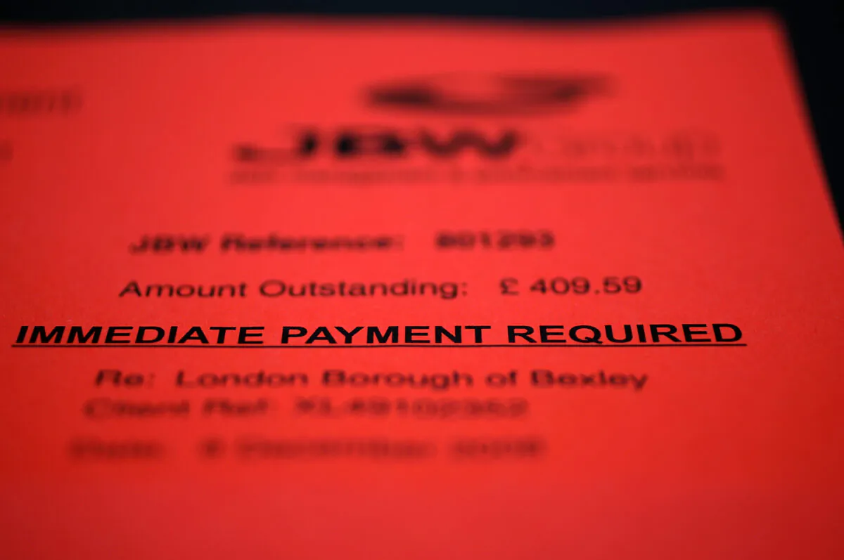 A demand letter from a debt recovery firm in London, on Dec. 14, 2008. (Oli Scarff/Getty Images)