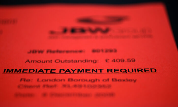 A demand letter from a debt recovery firm in London, on Dec. 14, 2008. (Oli Scarff/Getty Images)
