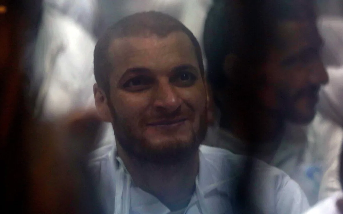 One of the 10 defendants belonging to Egypt's outlawed Muslim Brotherhood looks on during a courtroom session during their trial at the Tora courthouse complex in southeastern Cairo, on Jan. 30, 2022. (Khaled Kamel/AFP via Getty Images)