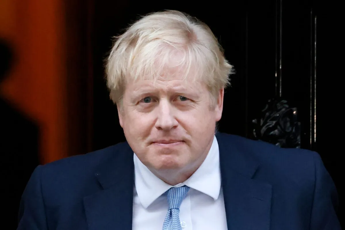 Britain's Prime Minister Boris Johnson leaves from 10 Downing Street to make a statement to MPs in the House of Commons following the publication of the Gray report, in central London on Jan. 31, 2022. (Tolga Akmen/AFP via Getty Images)