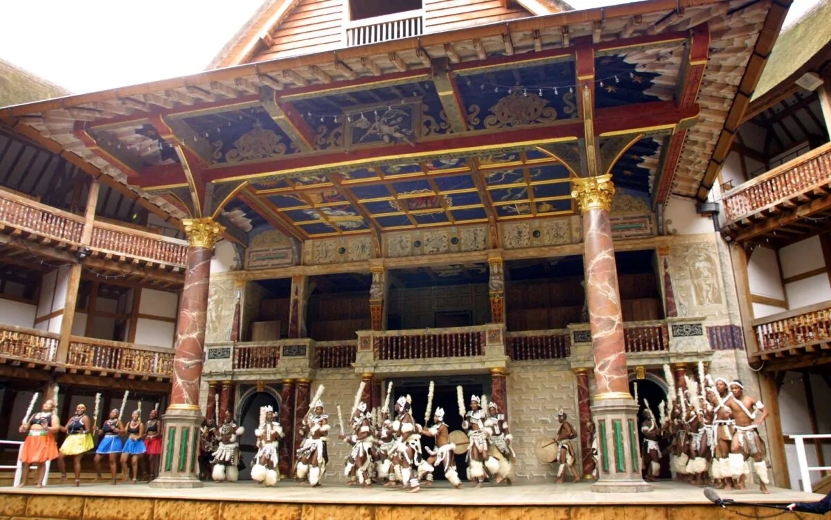 The cast of the Umabatha Company rehearse The Zulu Macbeth on the stage of Shakespeare's Globe Theatre in London on 18 April 2001. The cast of the Umabatha Company, made up from Zulus from South Africa. (Adrian Dennis/AFP via Getty Images)