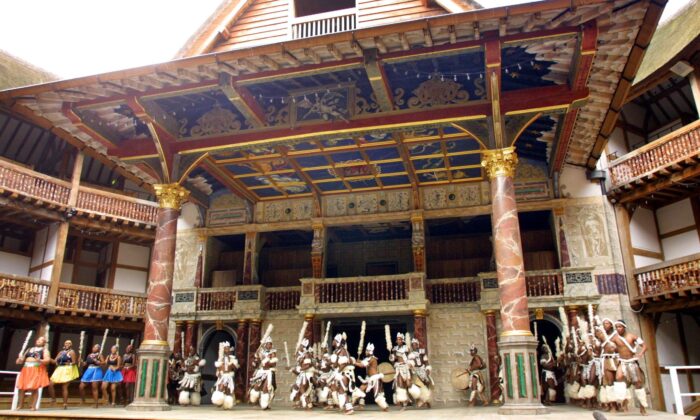 The cast of the Umabatha Company rehearse The Zulu Macbeth on the stage of Shakespeare's Globe Theatre in London on 18 April 2001. The cast of the Umabatha Company, made up from Zulus from South Africa. (Adrian Dennis/AFP via Getty Images)