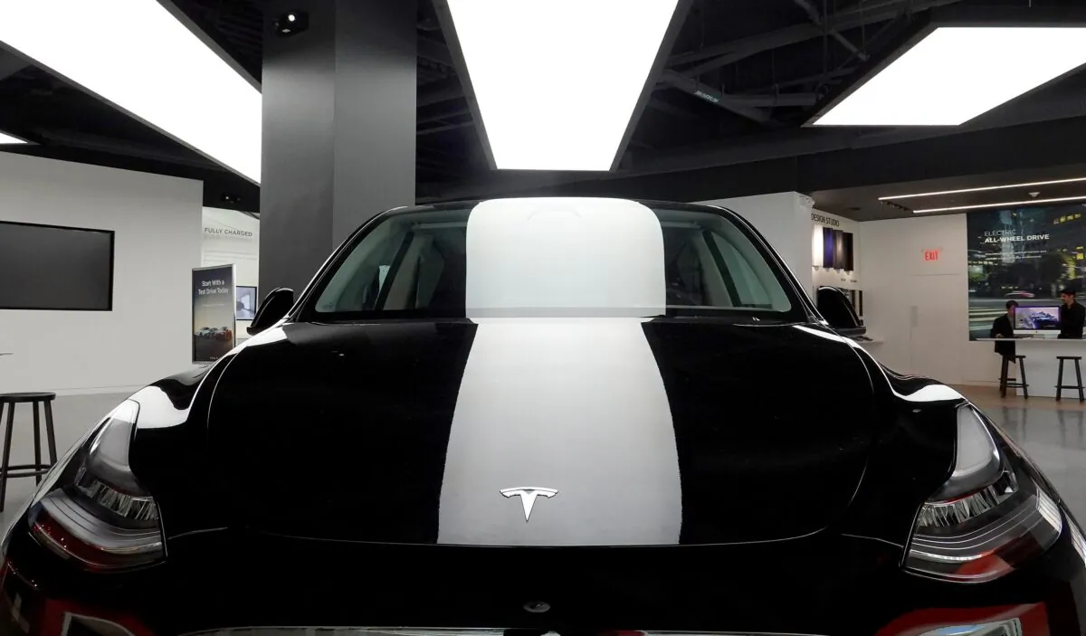 A Tesla Model Y electric vehicle is displayed on a showroom floor at the Miami Design District in Miami on Oct. 21, 2021. (Joe Raedle/Getty Images)