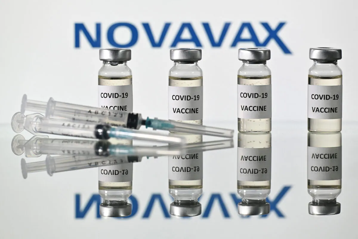 An illustration picture shows vials with COVID-19 Vaccine stickers attached and syringes with the logo of U.S. biotech company Novavax, on Nov. 17, 2020. (Justin Tallis/AFP via Getty Images)