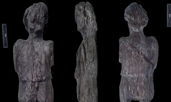 This undated handout image shows the ƒRoman carved wooden Figure uncovered by HS2 archaeologists in Buckinghamshire undergoing conservation (HS2/PA)