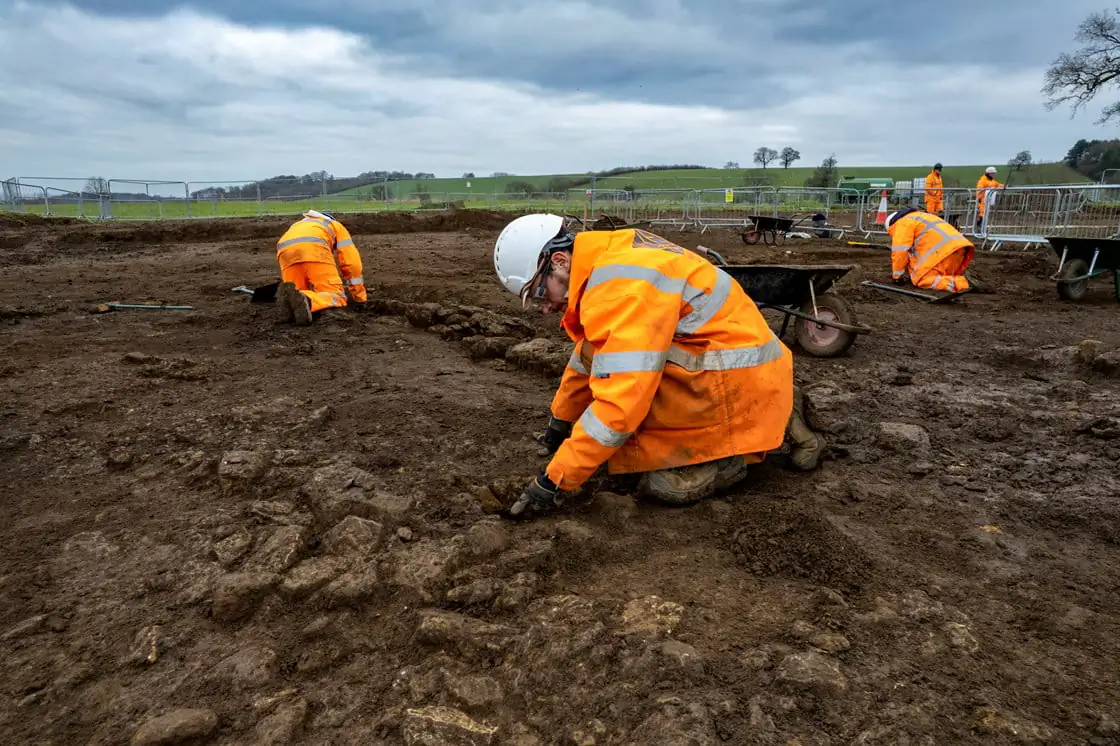 In this undated handout image, archaeologists excavate the  MOLA Headland Infrastructure site in Northamptonshire, England ahead of the construction of the HS2 line. (HS2/PA)
