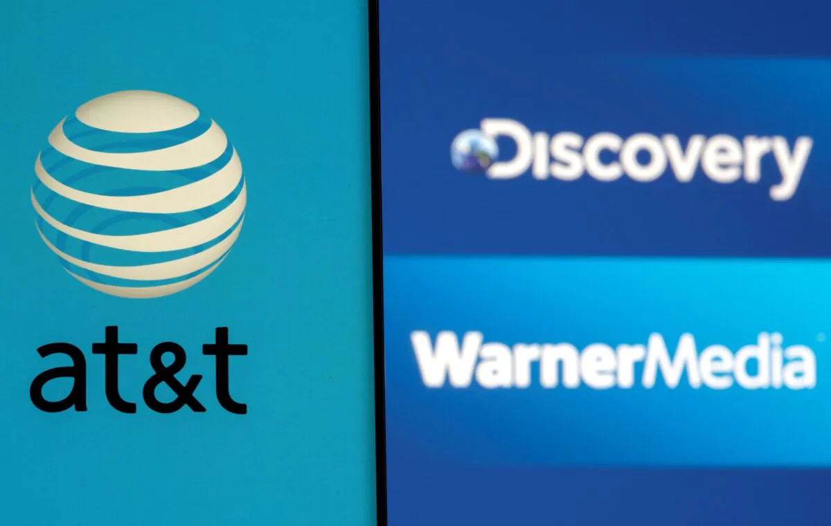 The AT&T logo displayed with Discovery and Warner Media logos. (Dado Ruvic/Reuters)