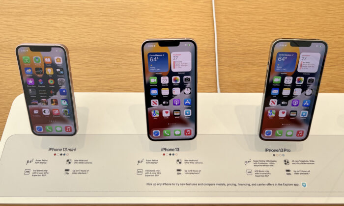 New iPhone 13s are displayed at an Apple store in Corte Madera, Calif., on Jan. 27, 2022. (Justin Sullivan/Getty Images)