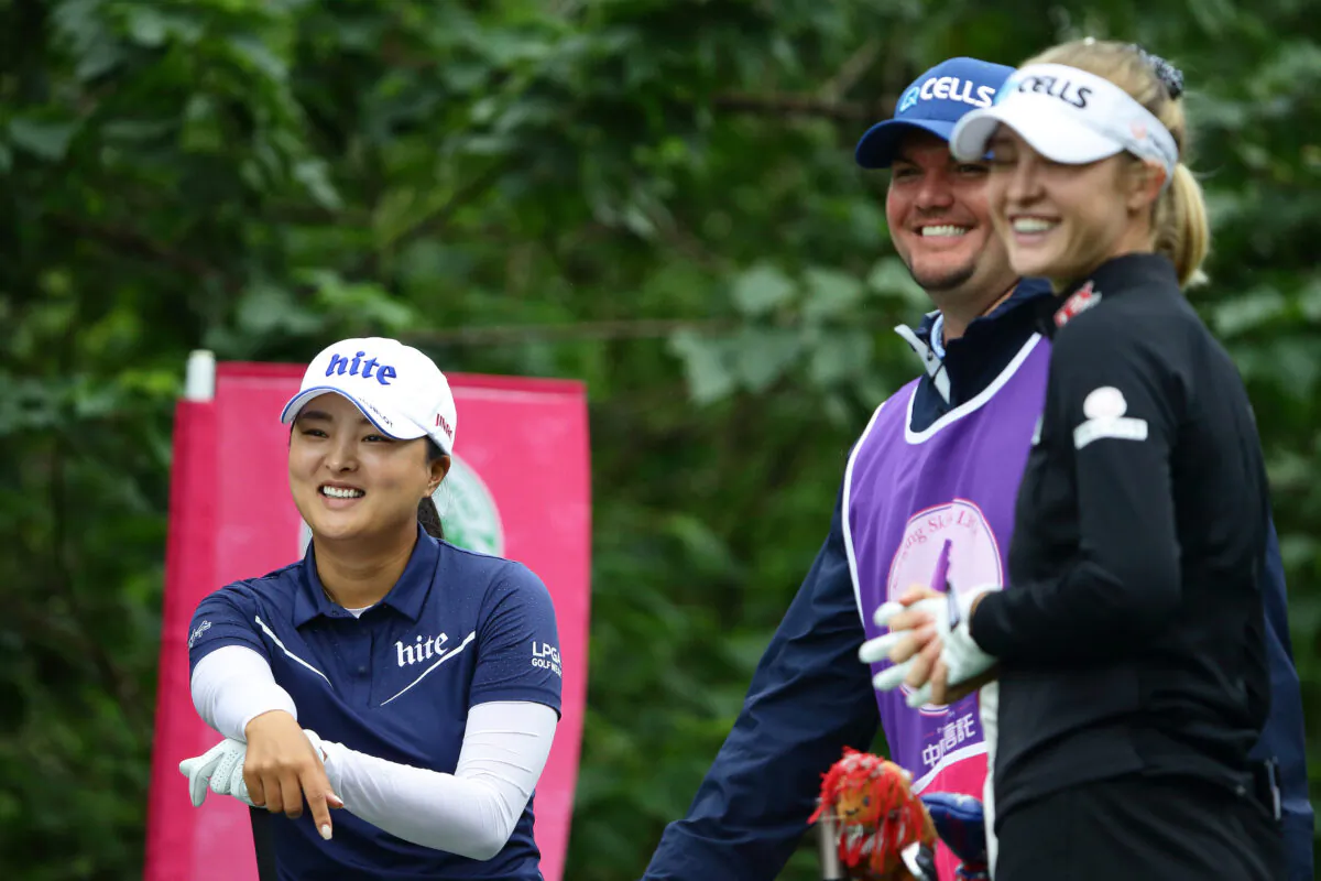 Jin Young Ko of South Korea chats with Nelly Korda of United States of America at 3rd hole during the first round of the Taiwan Swinging Skirts LPGA Presented By CTBC at Miramar Golf Country Club, in New Taipei City, Taiwan, on Oct. 31, 2019. (Suhaimi Abdullah/Getty Images)