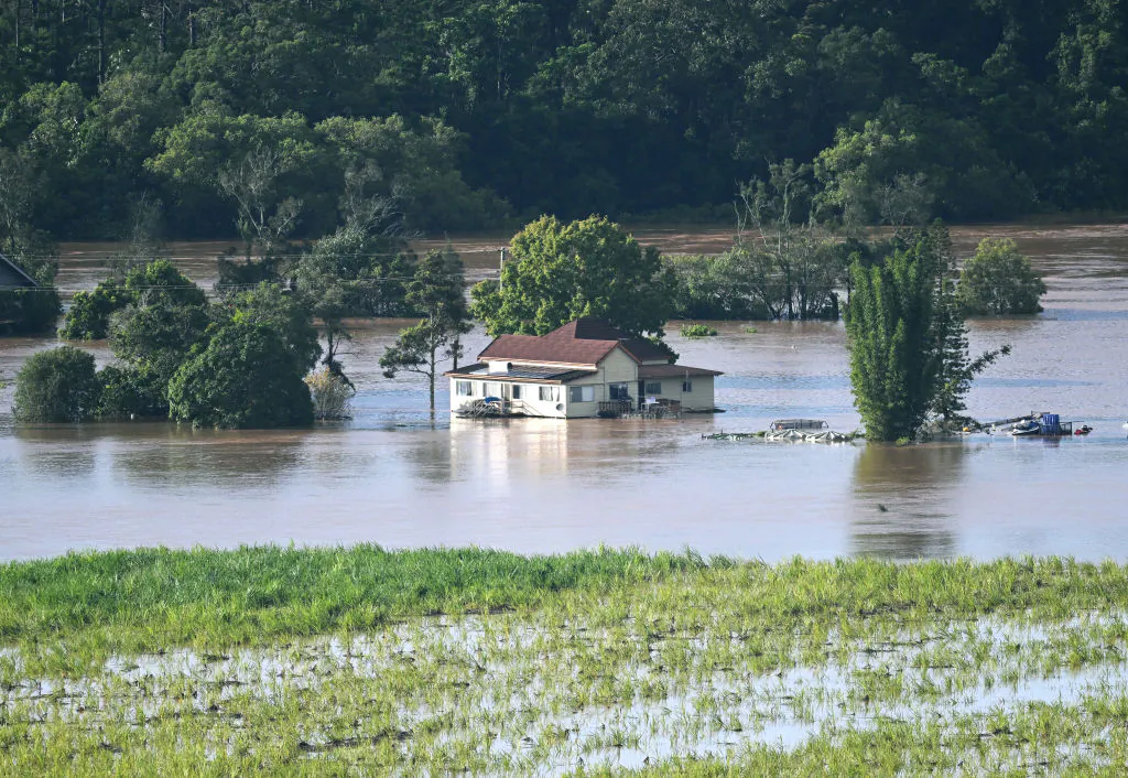 A farmhouse is surrounded by floodwater in Tumbulgum, on the NSW North Coast, Australia, on March 1, 2022. (Dan Peled/Getty Images)