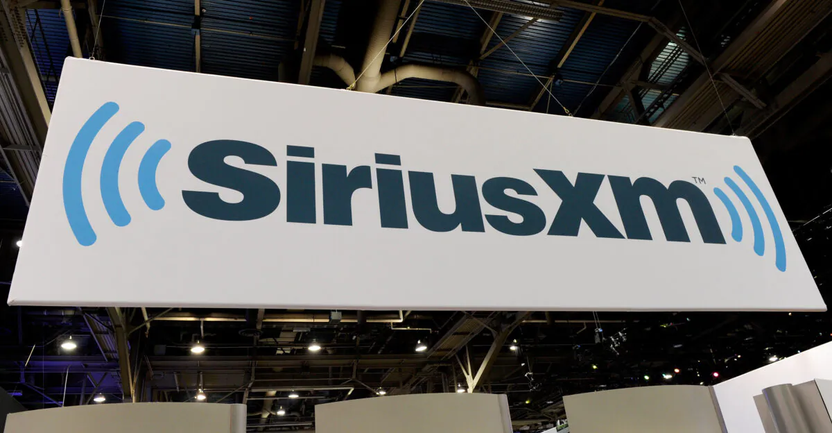 A sign for SiriusXM Radio is displayed at the Voxx International Corp. booth 2012 International Consumer Electronics Show at the Las Vegas Convention Center in Las Vegas, on Jan. 12, 2012. (Ethan Miller/Getty Images)
