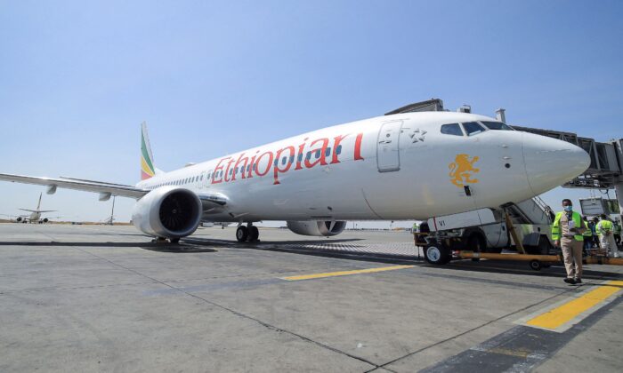 An Ethiopia’s Airlines Boeing 737 Max 8 plane to take off on a demonstration trip to resume flights from the Bole International Airport in Addis Ababa, Ethiopia, on Feb. 1, 2022. (Tiksa Negeri/Reuters)