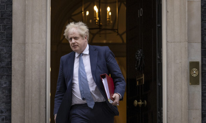British Prime Minister Boris Johnson leaves 10 Downing Street to attend the weekly Prime Minister’s Questions in the House of Commons in London, on Feb. 2, 2022. (Dan Kitwood/Getty Images)