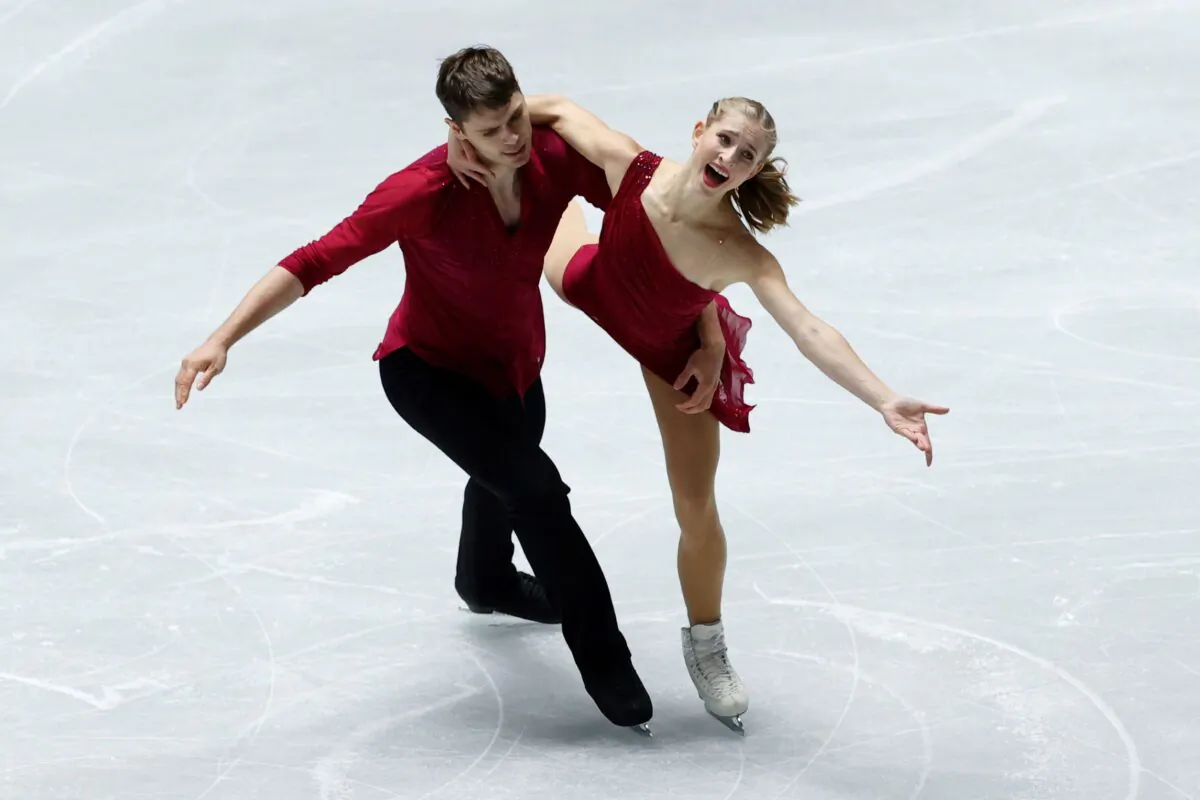 Germany's Minerva Fabienne Hase and Nolan Seegert (L) in action during the pairs short program at the ISU Grand Prix of Figure Skating, NHK Trophy, Yoyogi National Stadium 1st Gymnasium in Tokyo, Japan, on Nov. 12, 2021. (Issei Kato/Reuters)