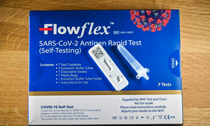 A Flowflex COVID-19 Lateral Flow (LFT) self-test kit, containing a SARS-CoV-2 Antigen Rapid Test, arranged for a photograph, in London on Feb. 20, 2022. (Justin Tallis/AFP via Getty Images)