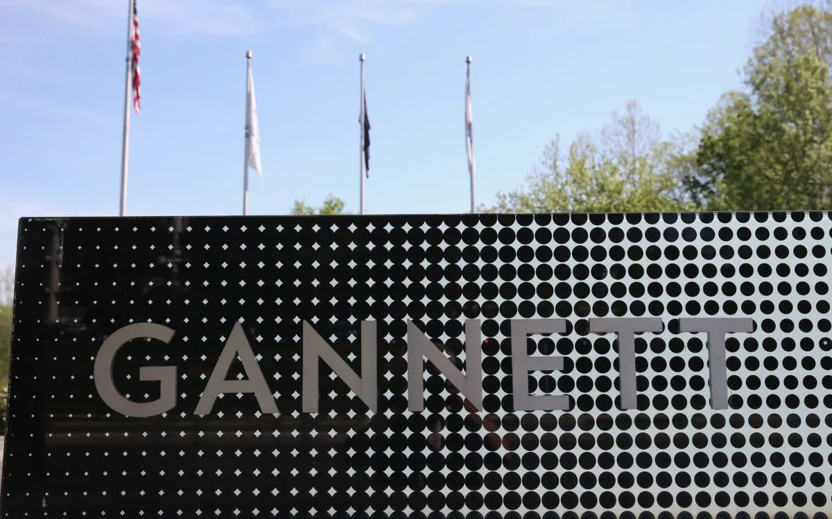 A sign in front of Gannett Co. Inc., headquarters is shown in Tysons Corner, Va., on April 25, 2016. (Mark Wilson/Getty Images)