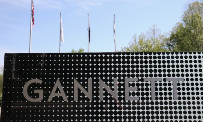 A sign in front of Gannett Co. Inc., headquarters is shown in Tysons Corner, Va., on April 25, 2016. (Mark Wilson/Getty Images)