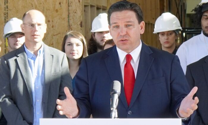 Florida Gov. Ron DeSantis (R) speaks to reporters at a press conference Feb. 2, 2022 at Santa Fe College in Gainesville, Fla. (Natasha Holt/The Epoch Times)