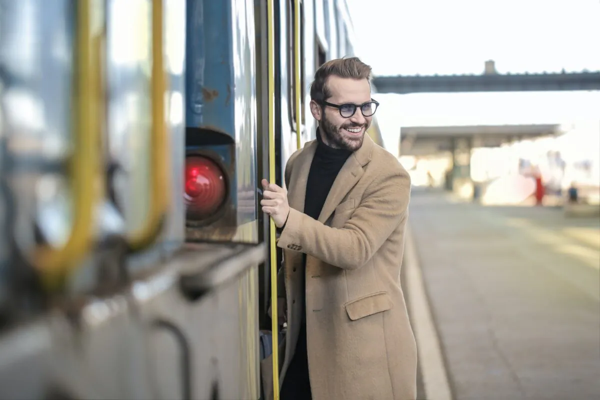 Stock photo of a person aboarding a train. (Andrea Piacquadio/Pexels)