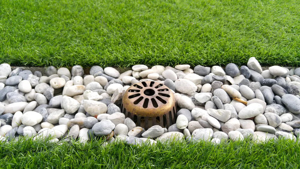 Proper drainage is often overlooked when building a house, but poor drainage can lead to problems that cause severe damage to the house structure. (Kamol Jindamanee/Shutterstock)