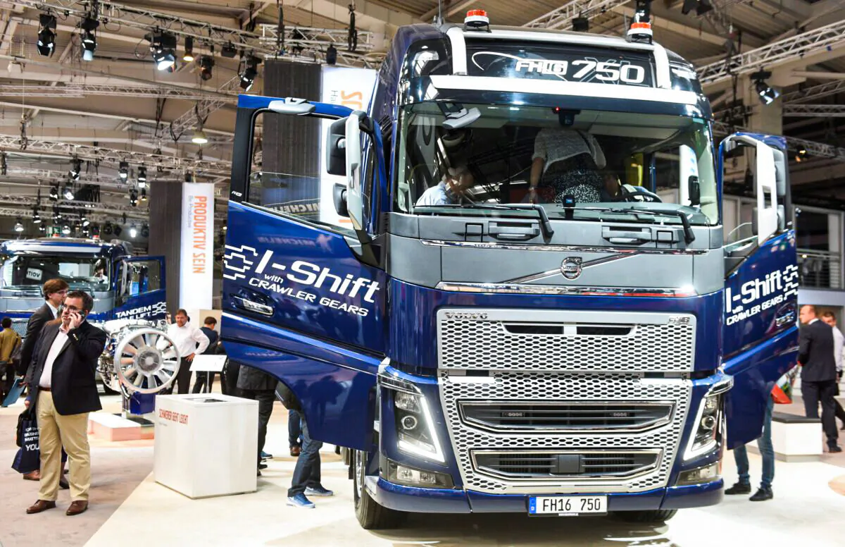Visitors surround a Volvo FH16 truck at the booth of Swedish truck maker Volvo at the IAA truck show in Hanover on Sept. 22, 2016.  (Fabian Bimmer/Reuters File Photo)