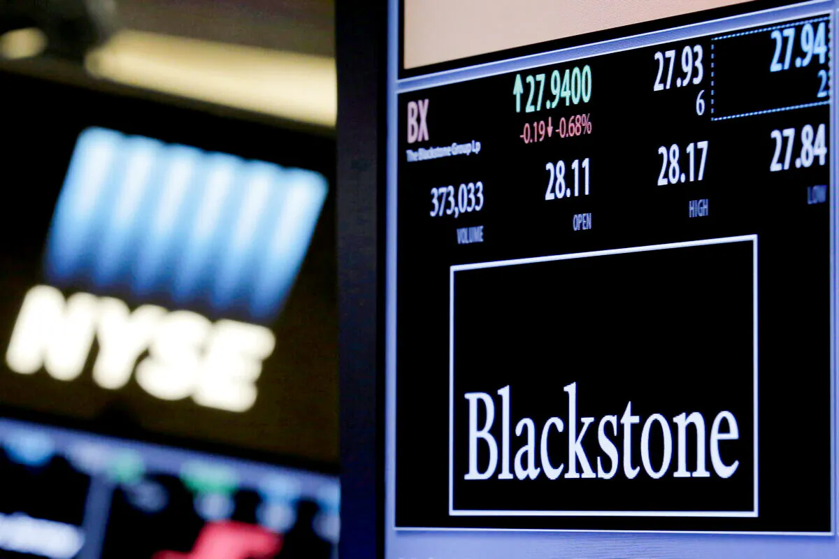 The ticker and trading information for Blackstone Group is displayed on the floor of the New York Stock Exchange on April 4, 2016. (Brendan McDermid/Reuters)
