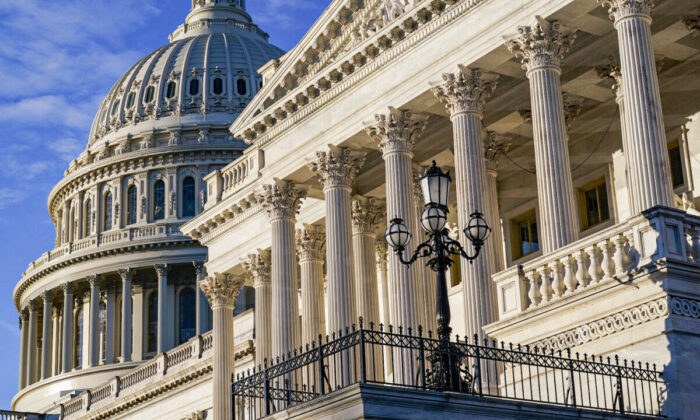 Light from the morning sun illuminates the Capitol in Washington on Dec. 3, 2021.  (J. Scott Applewhite/AP Photo)