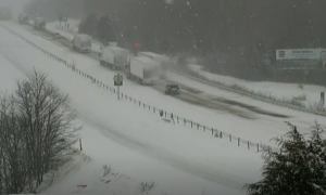 Snow Storm Traps Trucks on Missouri Interstate thumbnail