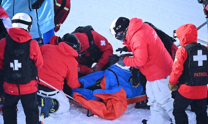 Rina Yoshika of Japan was treated after falling during training in Zhangjiakou, China on February 3, 2022.  (Dylan Martinez / Reuters)