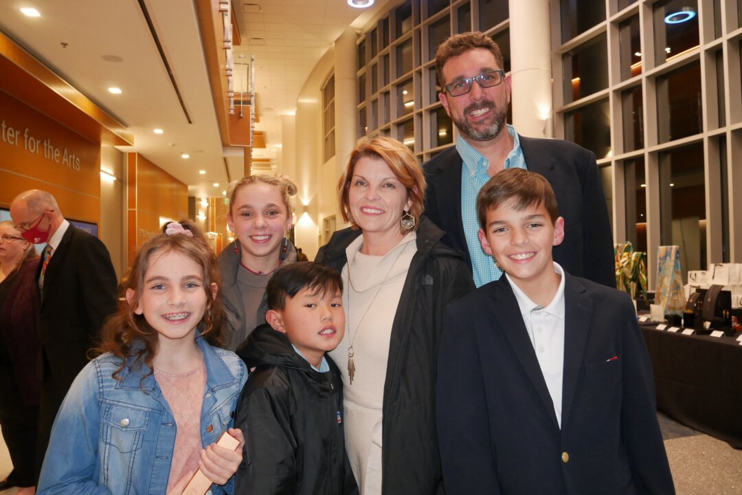 April Herndon (C) and her husband James Herndon (behind her) both spoke about how they thoroughly enjoyed watching Shen Yun Performing Arts at the ETSU Martin Center for the Arts, Johnson City, Tenn. on Feb. 3, 2022. (Sherry Dong/The Epoch Times)