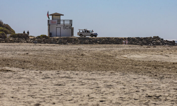 Bodies of two unresponsive adults were found deceased on the south end of Salt Creek Beach in Dana Point, Calif., on Feb. 4, 2022. (John Fredricks/The Epoch Times)