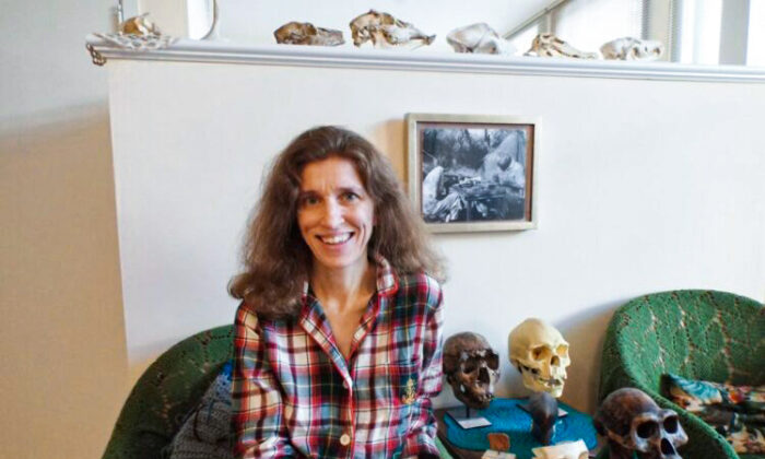 Dr. Elizabeth Weiss, a tenured professor of anthropology at San Jose State University who specializes in osteology—the study of human skeletal remains— poses with skulls in an undated photograph. (Photo courtesy of Pacific Legal Foundation)
