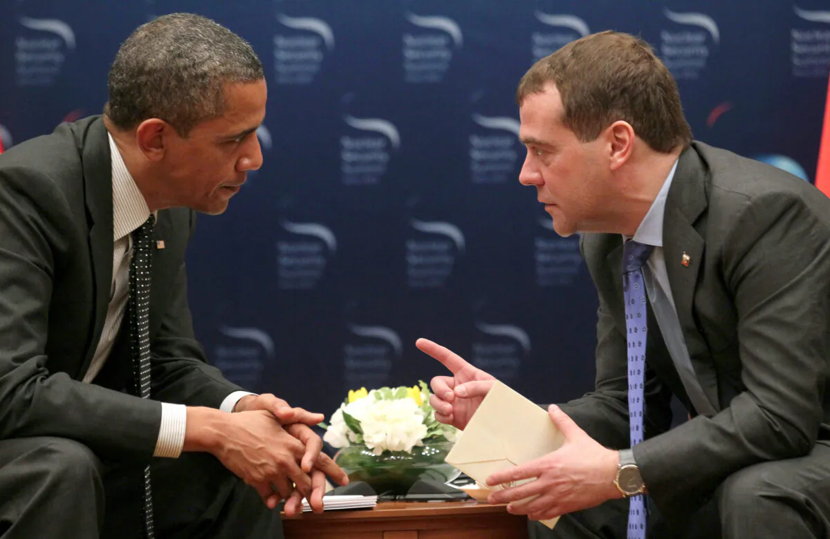 President Barack Obama (L) speaks with Russia’s President Dmitriy Medvedev in Seoul on March 26, 2012, during their bilateral meeting on the sidelines of the Seoul Nuclear Security Summit. (Yekaterina Shtukina/AFP/Getty Images)