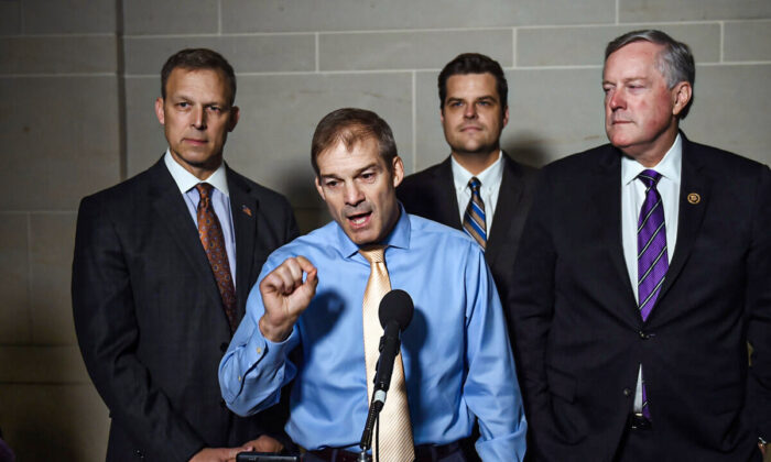 (L-R) Reps. Scott Perry (R-Pa.), Jim Jordan (R-Ohio), Matt Gaetz, (R-Fla.), and Mark Meadows, (R-N.C.), speak to reporters after a closed door meeting with Ambassador Gordon Sondland was cancelled on Capitol Hill in Washington on Oct. 8, 2019. (Olivier Douliery/AFP via Getty Images)