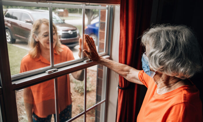 Some states now require nursing home visitors to prove they don't have COVID-19 as infection rates rise among the well-vaccinated nursing home population. (Ursula Page/Shutterstock)