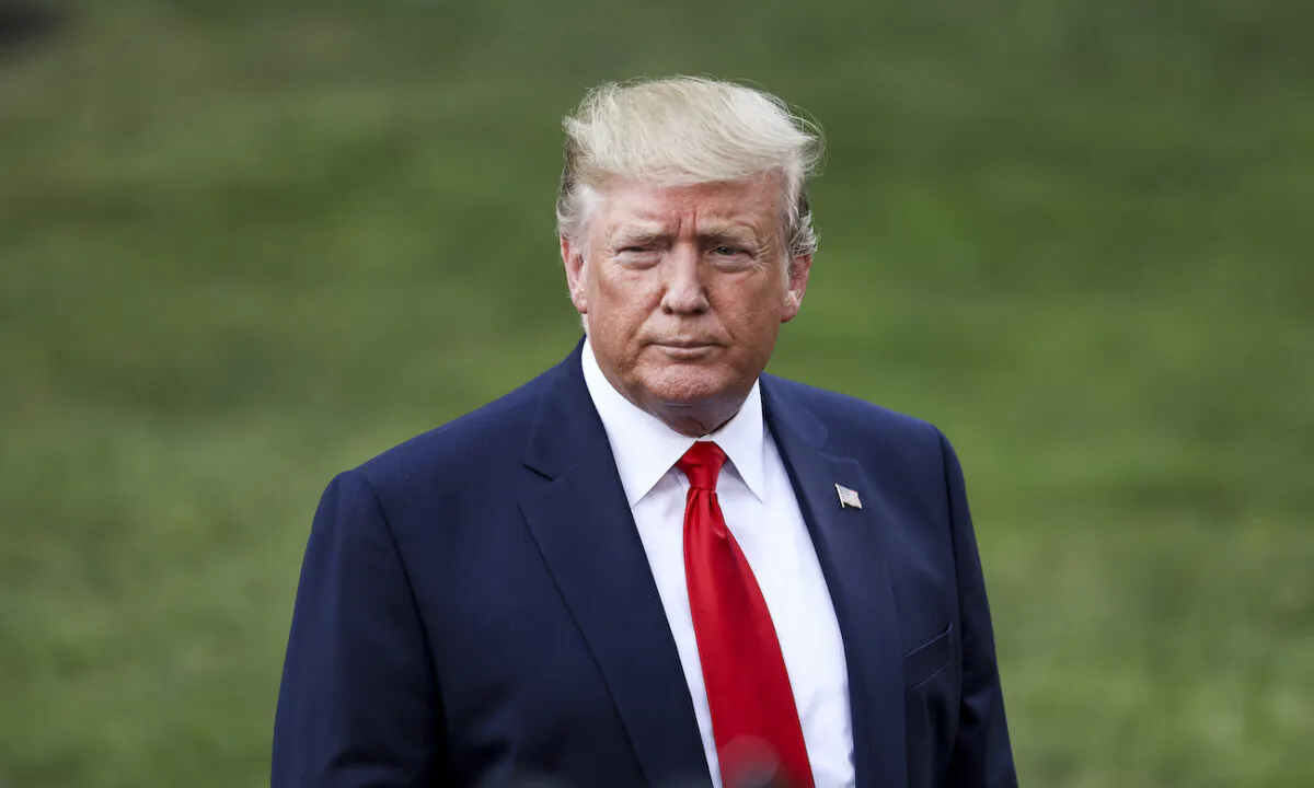 Then-President Donald Trump speaks to the media before boarding Marine One en route to Ohio on the White House South Lawn in Washington on Aug. 1, 2019. (Charlotte Cuthbertson/The Epoch Times)
