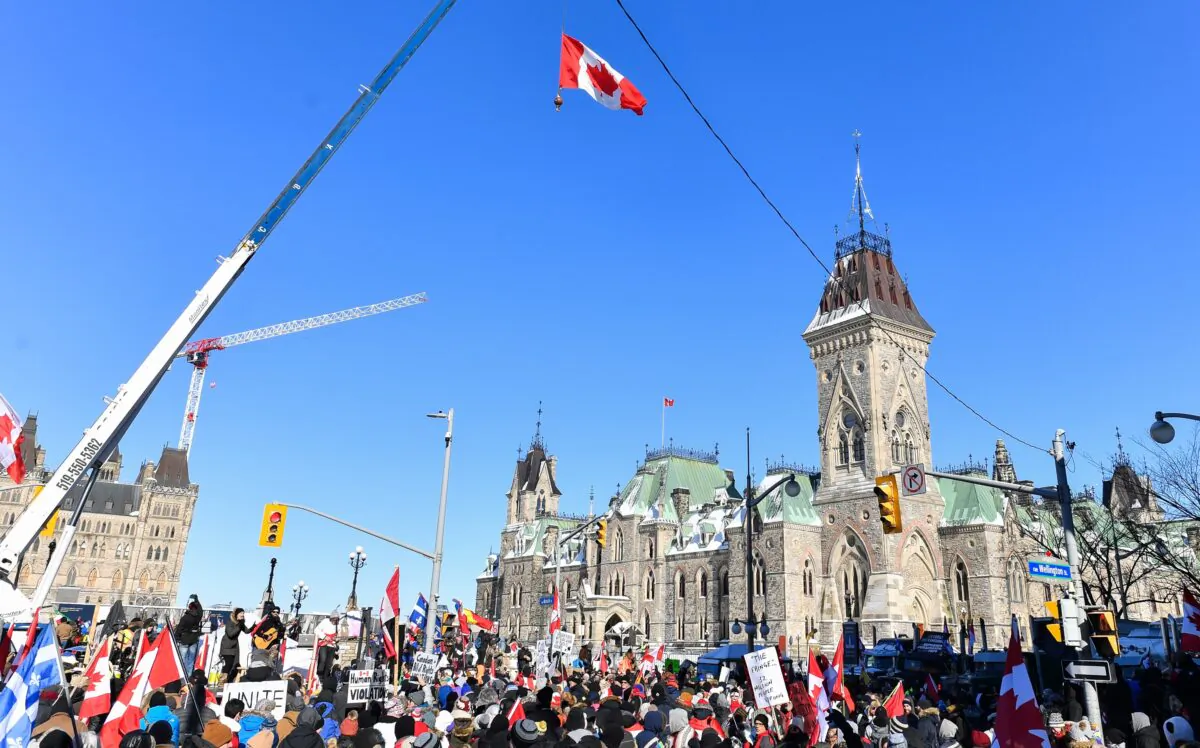 Thousands gather around Parliament Hill in support of the truckers' Freedom Convoy protest in Ottawa on Feb. 5, 2022. (Minas Panagiotakis/Getty Images)