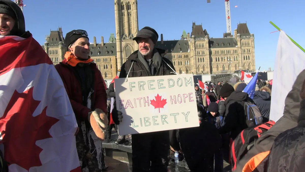 Protesters gather on Parliament Hill in Ottawa to demonstrate against COVID-19 mandates and restrictions on Feb. 5, 2022. (Annie Wu/NTD)