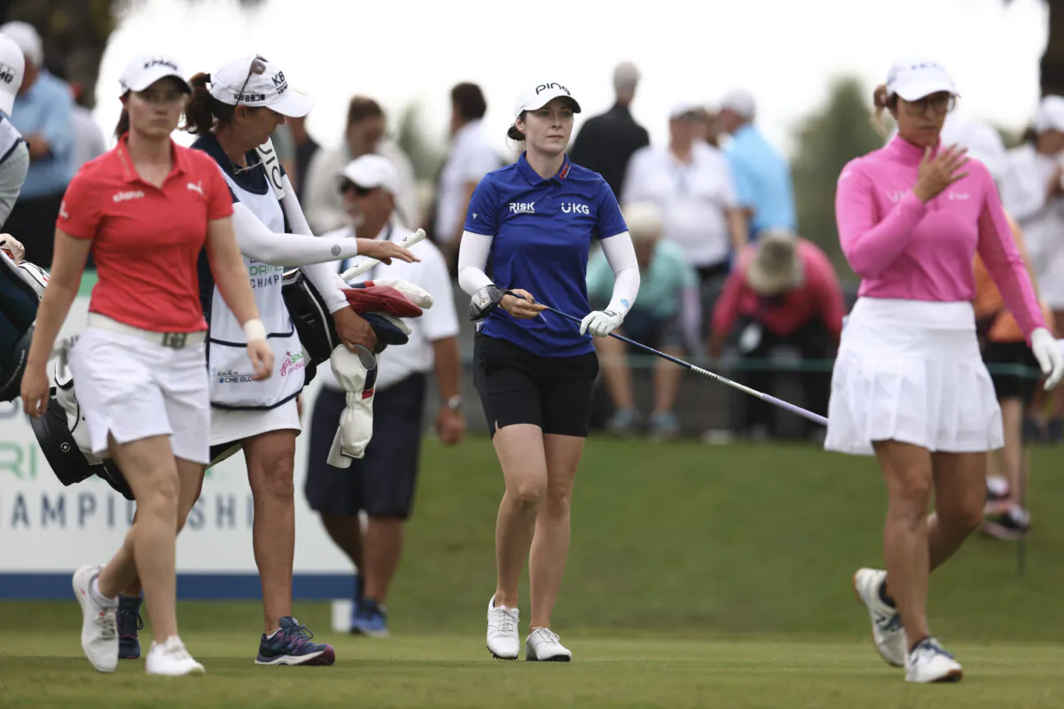 Leona Maguire of Ireland (L), Brittany Altomare (C), and Marina Alex (R) walk from the 1st tee during the final round of the LPGA Drive On Championship at Crown Colony Golf & Country Club, in Fort Myers, Fla., on Feb. 5, 2022. (Douglas P. DeFelice/Getty Images)