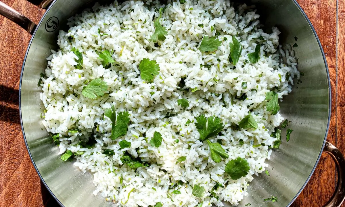 The simple preparation and bright flavors of this rice pair well with any protein. (Sahara Henry Bohoskey/TNS)